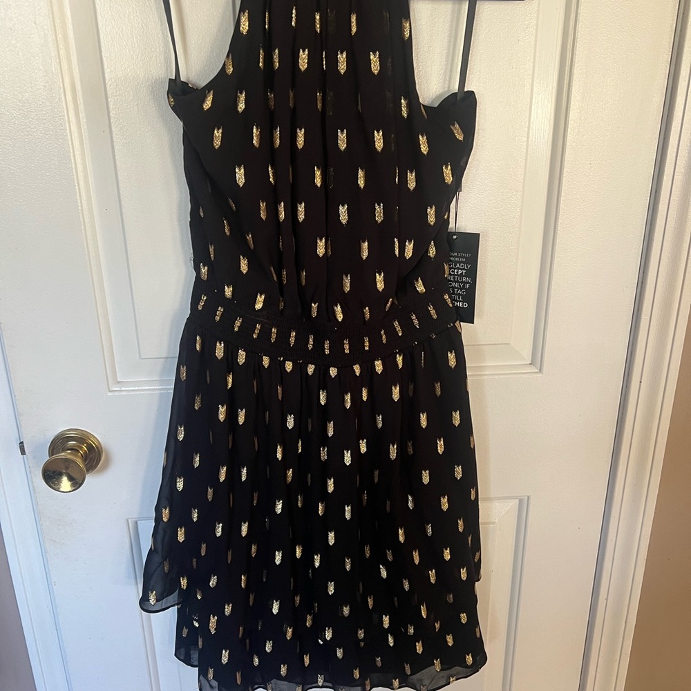 Chic Black and Gold dress from WHBM.  NWT. Knee length.  Size 8